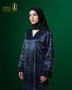 "The Azure Flow Abaya: Modern Artistry Meets Modest Luxury"