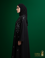 The Shimmering Anchor Abaya: Where Sparkle Meets Steadfast Style